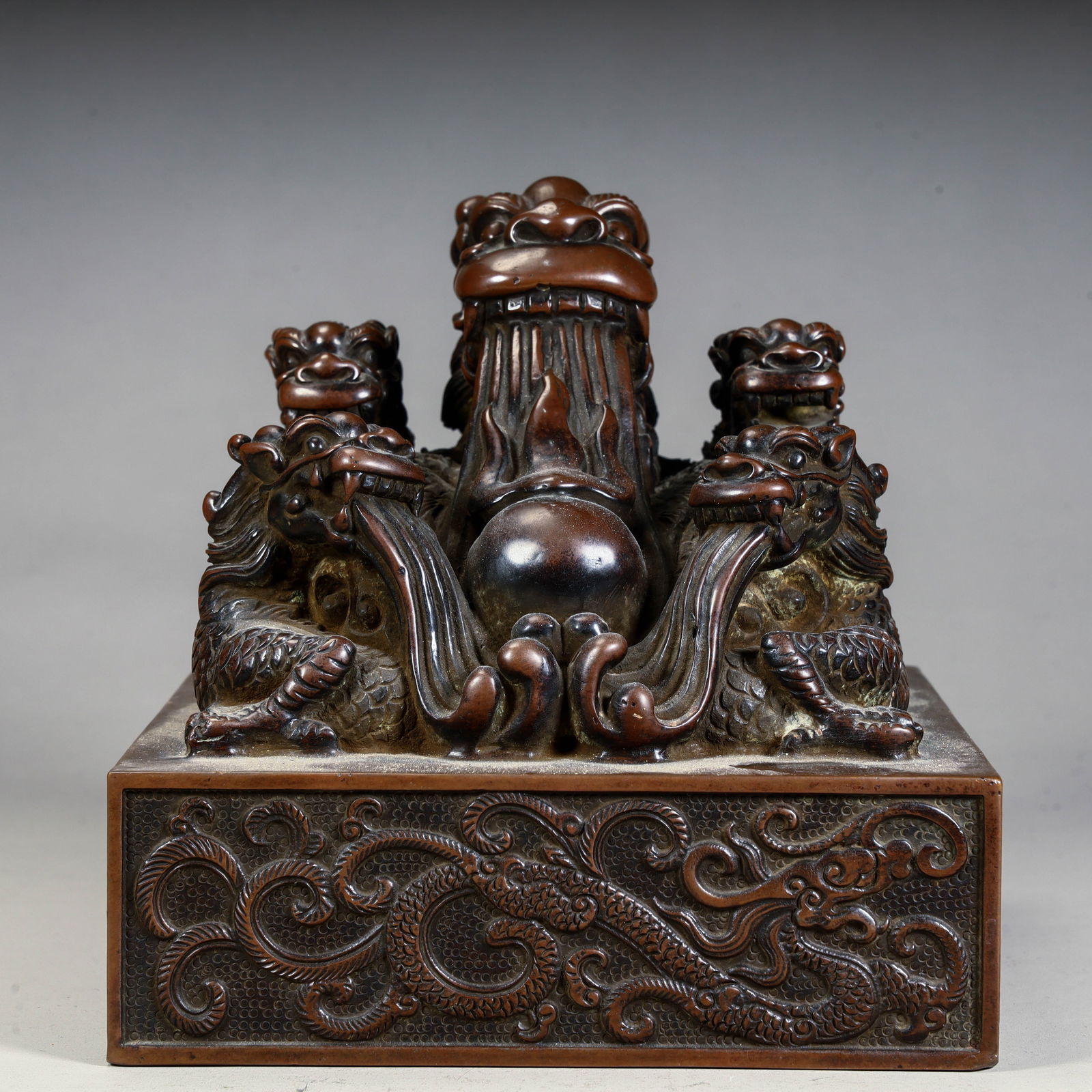 A bronze multi-dragon button seal from the Qing Dynasty (1 of 10)