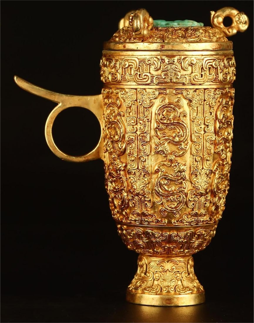 A Han Dynasty gold beast pattern cup (1 of 9)