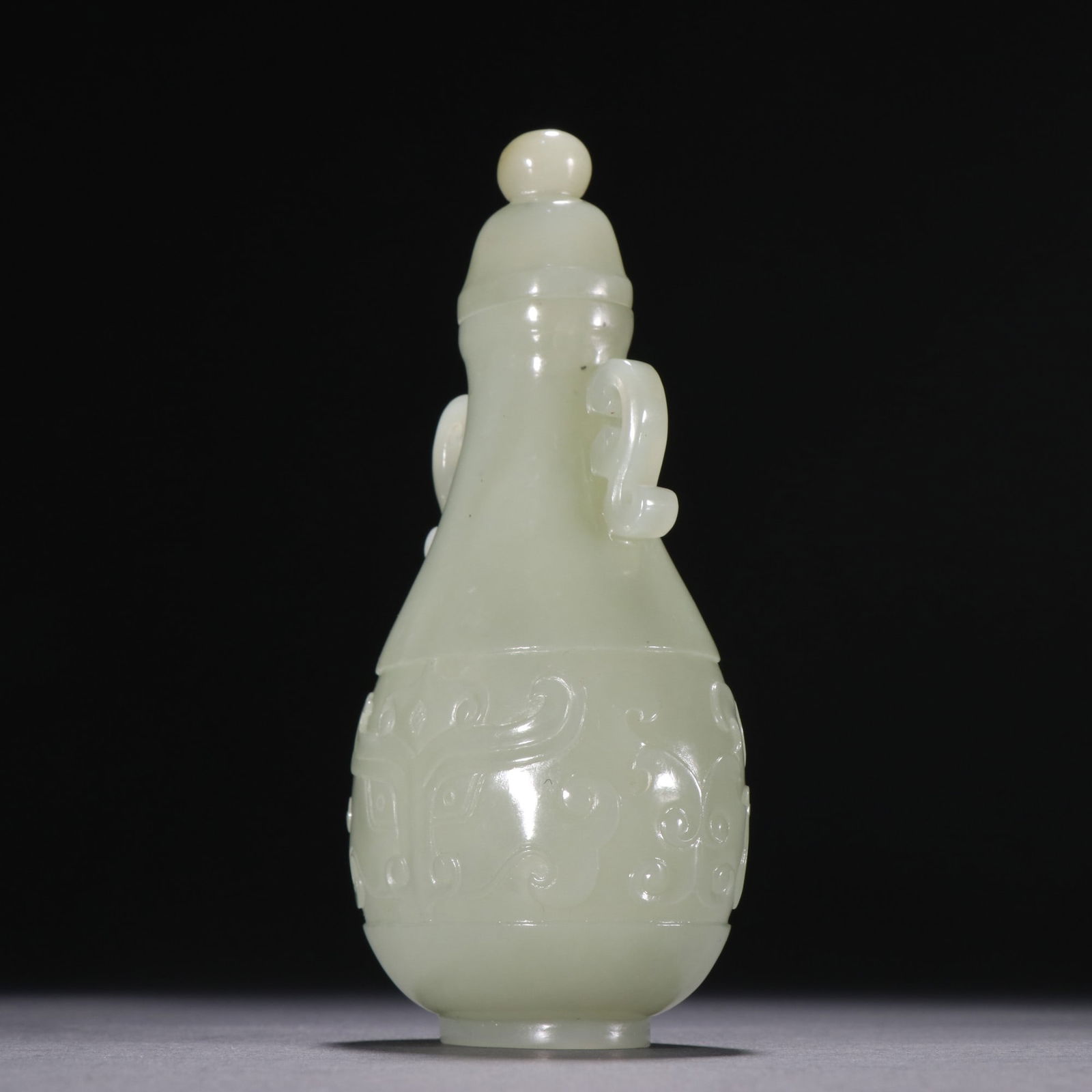 A Qing Dynasty Hetian jade gluttonous pattern lid bottle - 4
