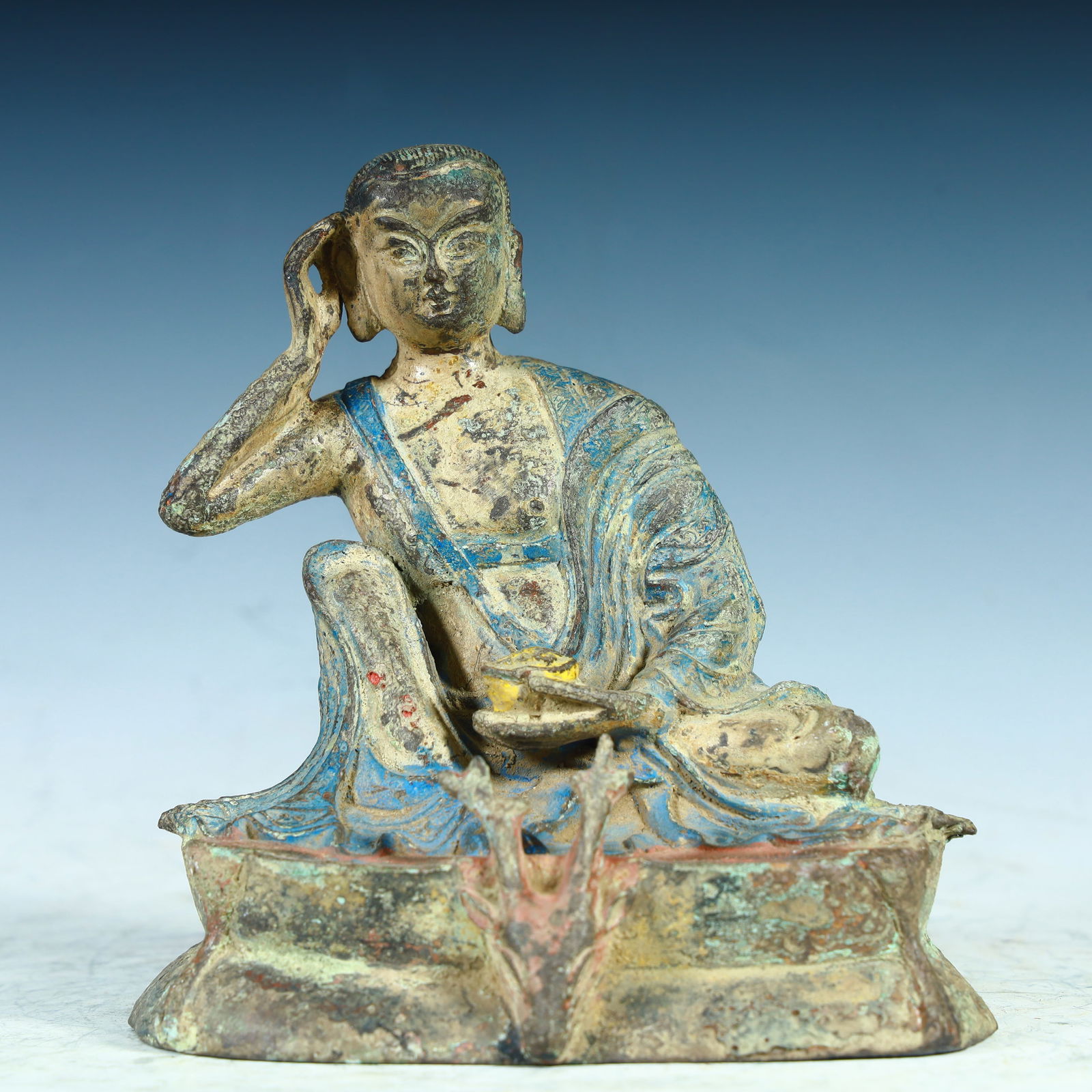 A bronze painted Milarepa from the Tang Dynasty: Bronze painted Milarepa Venerable in the Tang Dynasty SIZE: H:13cm L: 12.5cm W:8.5cm W:492g (The Dimensions Of All Batches Are Manually Measured.If You Need More Detailed