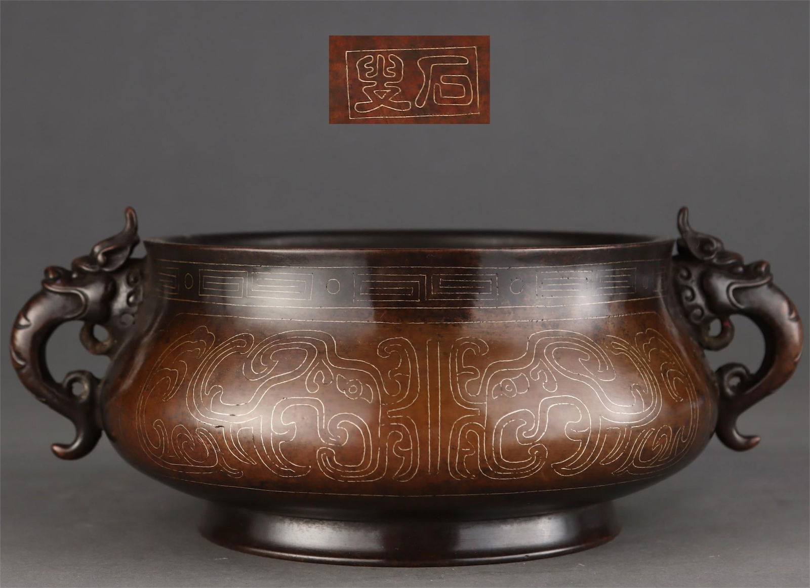 A Ming Dynasty precisely cast copper tire wrong silver wire Kuifeng pattern chicken ear furnace (1 of 9)