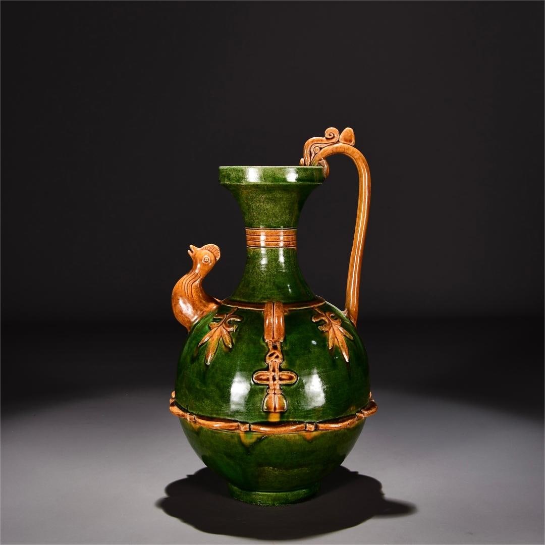 A green glazed dragon and phoenix pattern pot from the Tang Dynasty: Tang Dynasty green glazed dragon and phoenix pattern pot Size:H:35cm W:21cm (The Dimensions Of All Batches Are Manually Measured.If You Need More Detailed Information, Please
