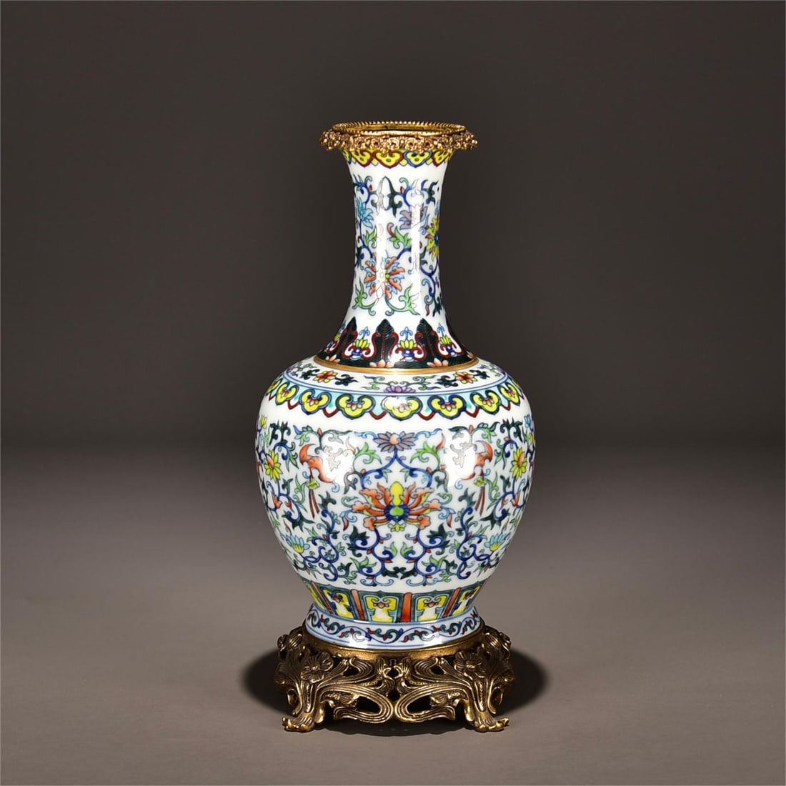 A bronze gilt vase inlaid with a Doucai Fushou picture made in the Qianlong period of the Qing: The Qing Dynasty Qianlong year system Doucai Fushou picture inlaid with copper gilt vase Size:H:30cm W:14cm (The Dimensions Of All Batches Are Manually Measured.If You Need More