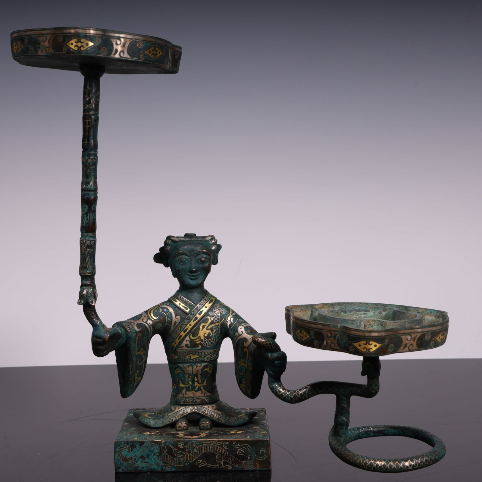 A bronze wax table of the Han Dynasty: The bronze wax table of the Han Dynasty SIZE: L: 33.5cm W:17cm H:32.6cm W:3.2kg (The Dimensions Of All Batches Are Manually Measured.If You Need More Detailed Information, Please