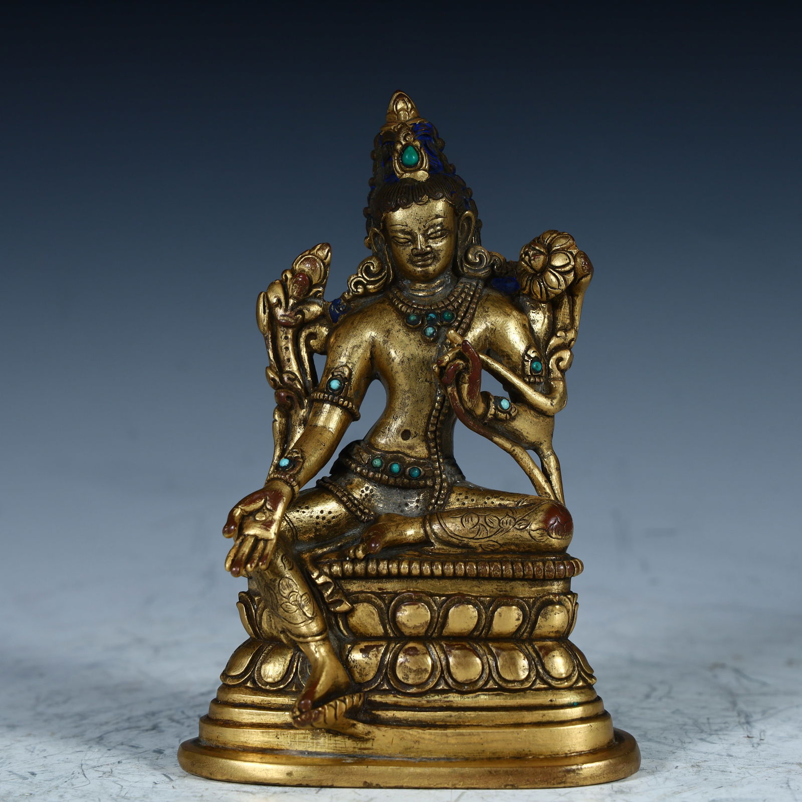 A copper-gilt green Tara Buddha statue from the Qing Dynasty: Qing Dynasty copper gilt green Tara Buddha statue SIZE:H:13.5cm L: 8.9cm W:6cm W:0.6kg (The Dimensions Of All Batches Are Manually Measured.If You Need More Detailed Information, Please Contact Our Cu