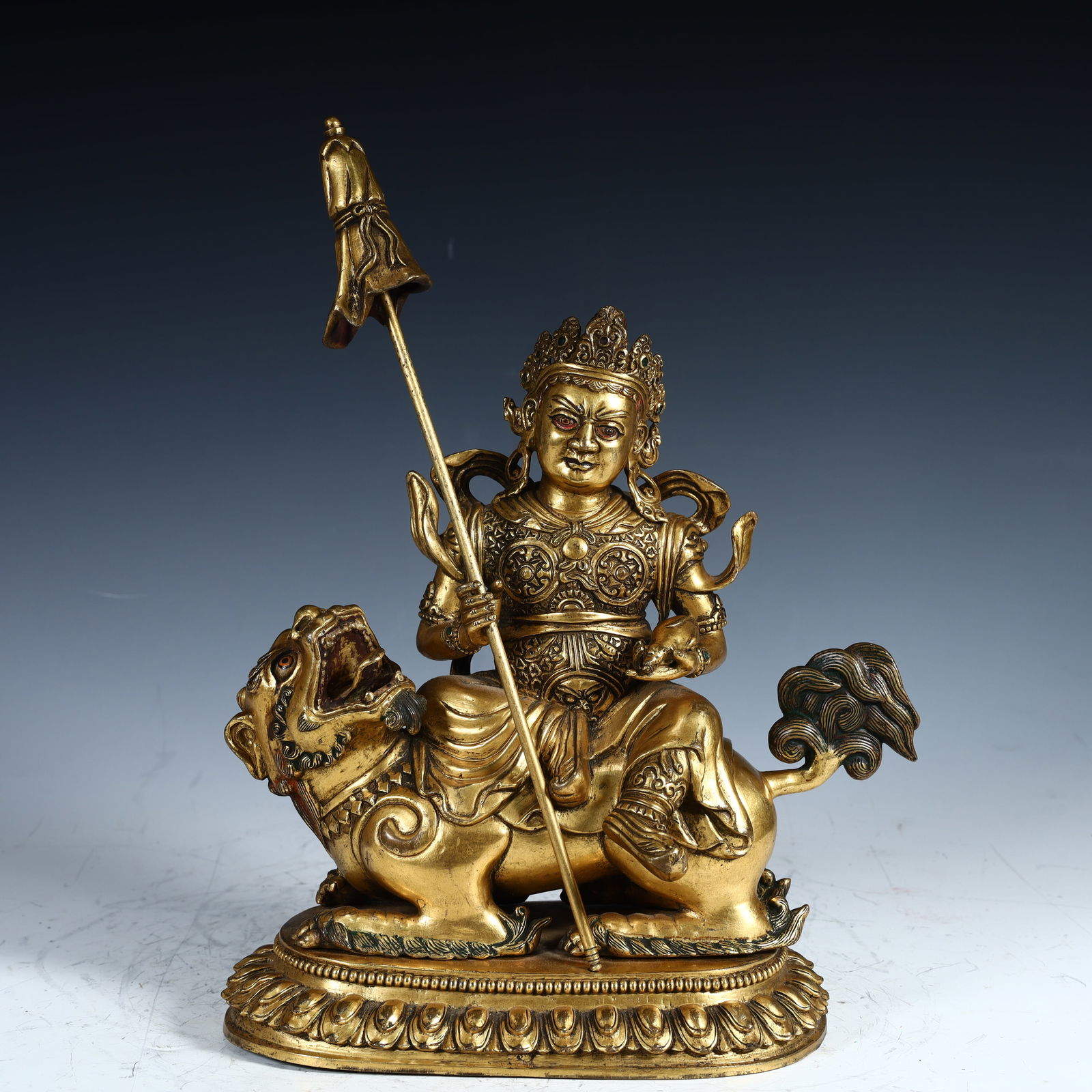A copper-gilt god of wealth in the Qing Dynasty: The copper-gilt god of wealth in the Qing Dynasty SIZE:H:29.5cm L: 20cm W:11cm W:4.1kg (The Dimensions Of All Batches Are Manually Measured.If You Need More Detailed Information,