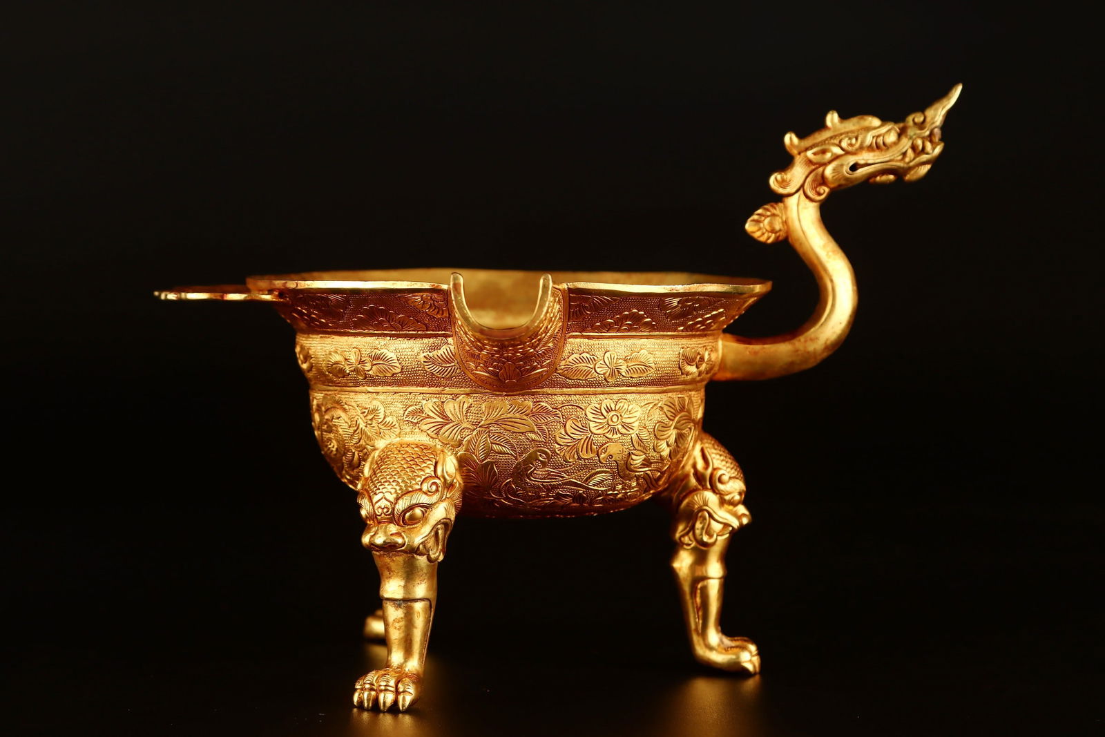 A copper-gilt dragon cup from the Tang Dynasty (1 of 9)