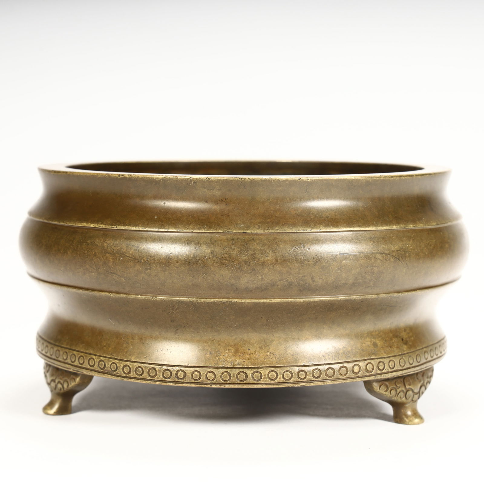 A copper string-patterned three-legged incense burner from the Qing Dynasty (1 of 8)