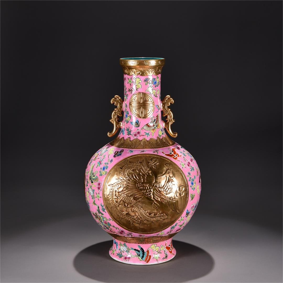 A red background pastel consecrated carved gilt dragon and phoenix pattern amphora made in the: Qing Dynasty Qianlong year red background pastel consecrated carved gilt dragon and phoenix pattern amphora Size:H:52cm W:32cm (The Dimensions Of All Batches Are Manually