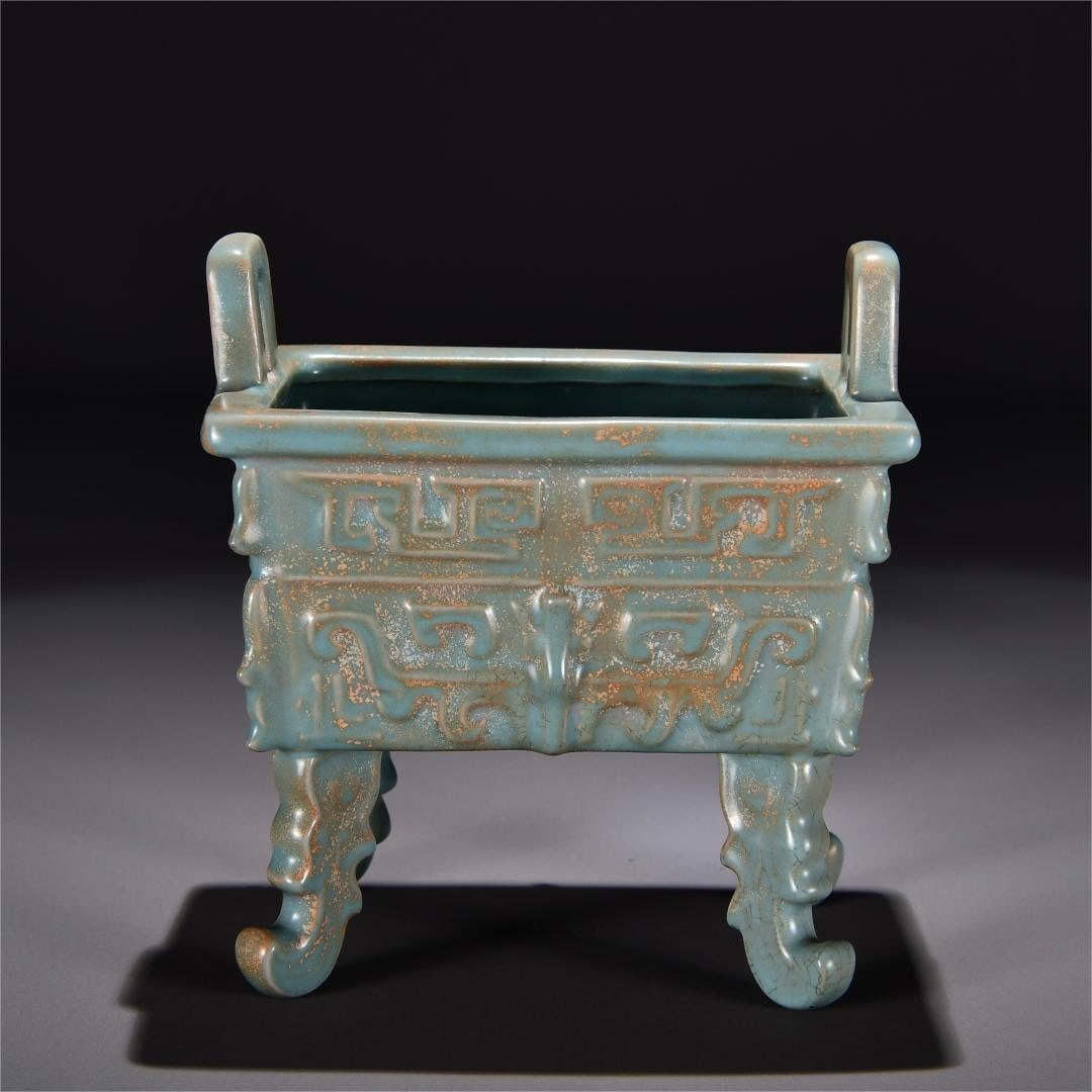 A four-legged square tripod with azure glaze gluttonous pattern from the Ru kiln in the Song Dynasty: The azure glaze gluttonous pattern four-legged square tripod of the Ru kiln in the Song Dynasty Size:H:19cm W:18cm (The Dimensions Of All Batches Are Manually Measured.If You Need