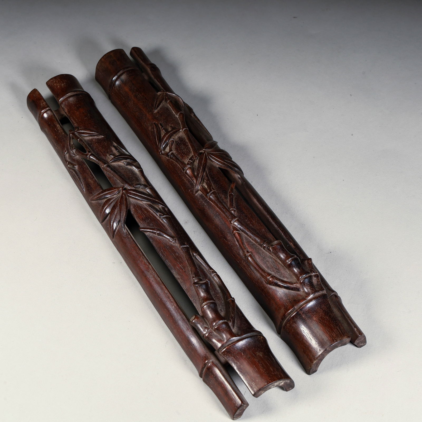 A Qing Dynasty rosewood carved bamboo strip paperweight: Qing Dynasty rosewood carved bamboo strip paperweight Size: H:3.5cm L:29cm W:4.5cm W:257g (The Dimensions Of All Batches Are Manually Measured.If You Need More Detailed Information, Please Contact Our