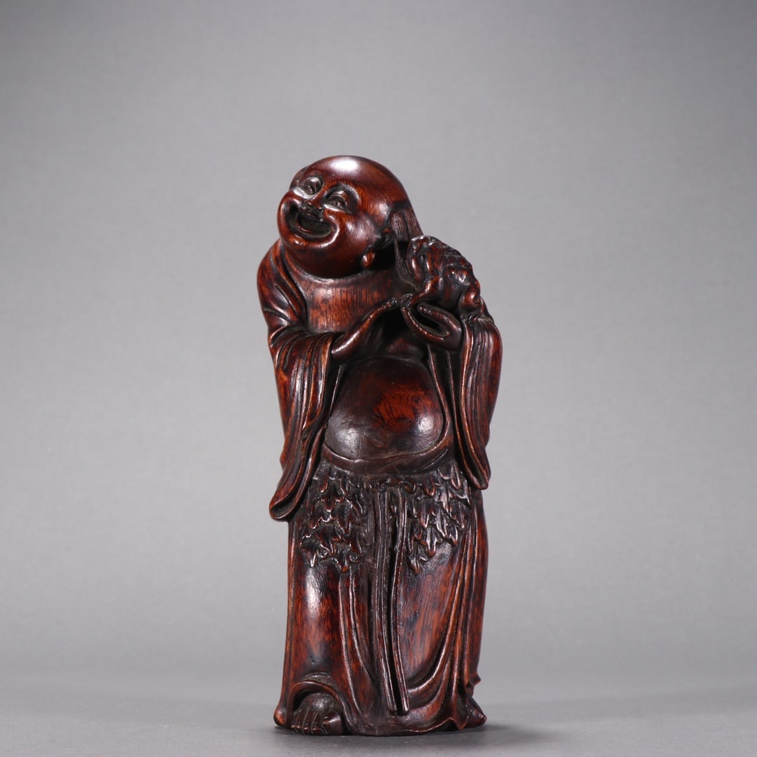 A Qing Dynasty agarwood bangs play golden toad ornament: Qing Dynasty agarwood bangs play golden toad ornament Sixe:H:19cm W:6.5cm W:163.6g (The Dimensions Of All Batches Are Manually Measured.If You Need More Detailed Information,