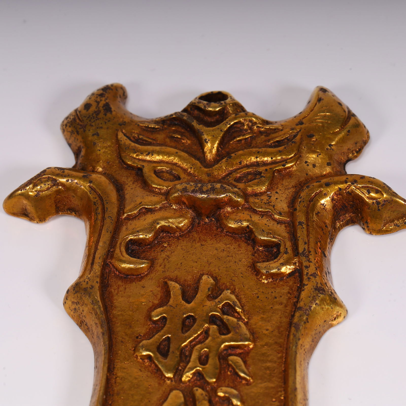 A fine copper-gilt token - 2