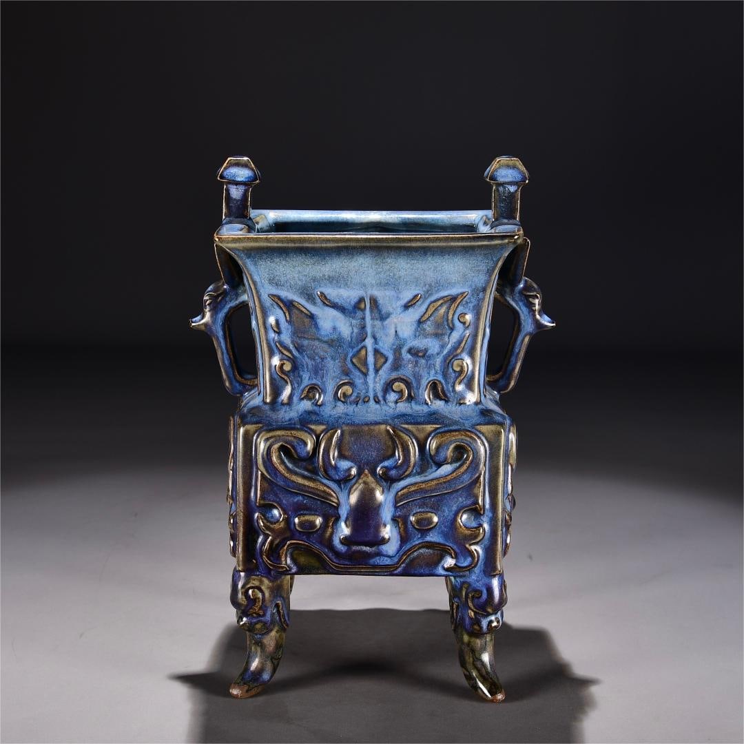 A grape purple glazed animal face pattern square tripod furnace of the Song Dynasty Jun kiln: The grape purple glaze animal face pattern square tripod furnace of the Song Dynasty Jun kiln Size:H:26cm W:22cm (The Dimensions Of All Batches Are Manually Measured.If You Need