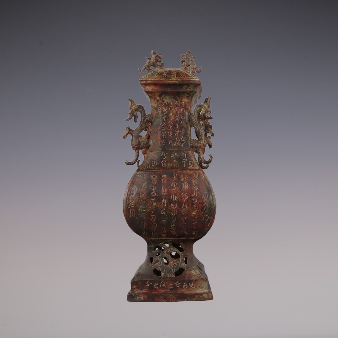 An Exquisite Bronze With Inscription Double-Ears Vase: An Exquisite Bronze With Inscription Double-Ears Vase Han Dynasty, China Size:14cmx42cm Weight:3600g (The Dimensions Of All Batches Are Manually Measured.If You Need More Detailed Information, Please