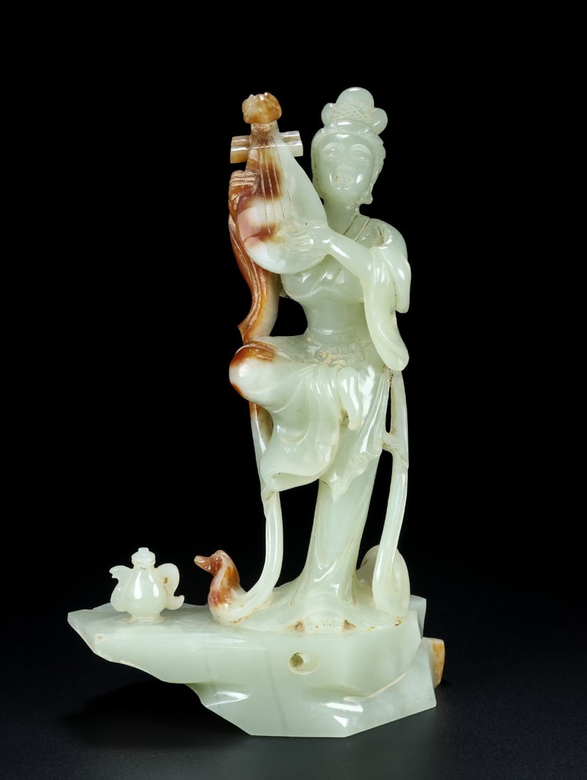 An Exquisite White Jade Figure Ornament: An Exquisite White Jade Figure Ornament Han Dynasty, China Size:20.7cmx13.5cmx6.2cm Weight:908.5g (The Dimensions Of All Batches Are Manually Measured.If You Need More Detailed Information, Please