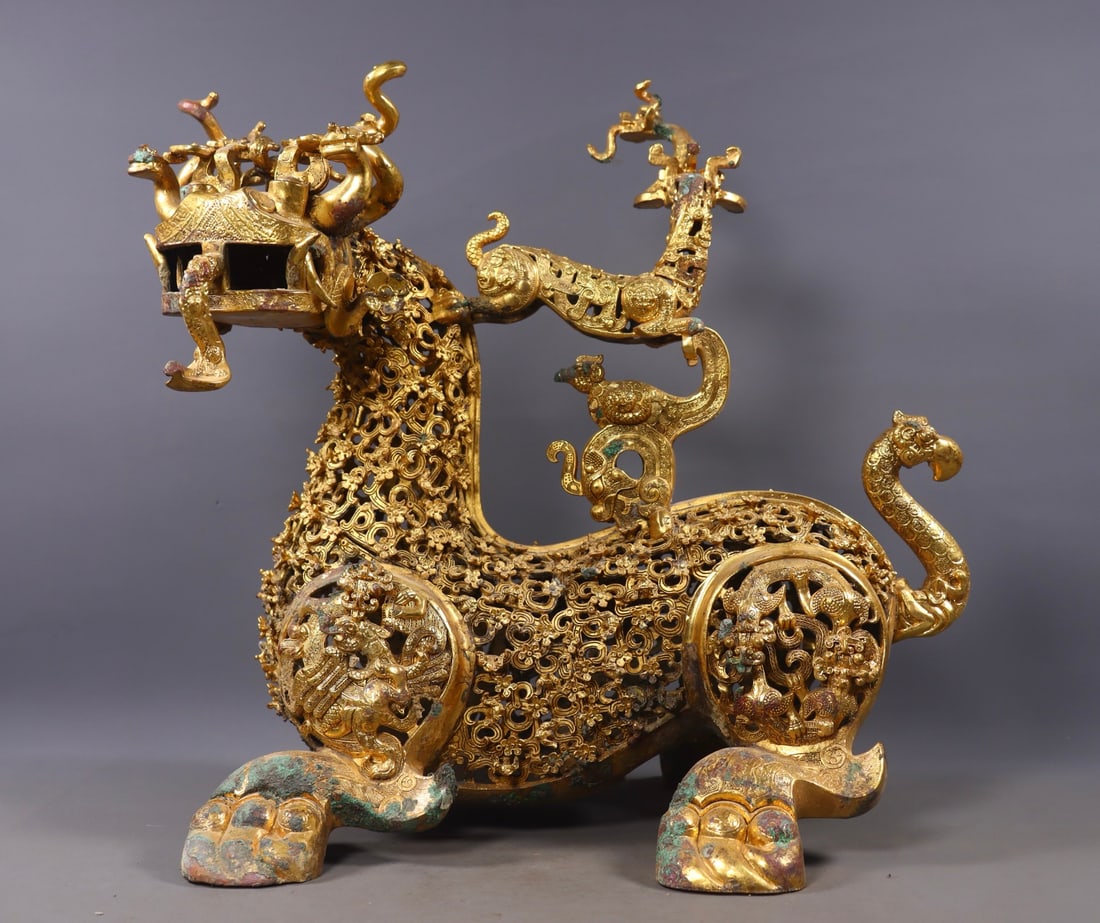 An Exquisite Gilt Bronze With Inscription Auspicious Beast Ornament: An Exquisite Gilt Bronze With Inscription Auspicious Beast Ornament Han Dynasty, China Size:38.5cmx39cmx29.5cm Weight:6160g (The Dimensions Of All Batches Are Manually Measured.If You Need More