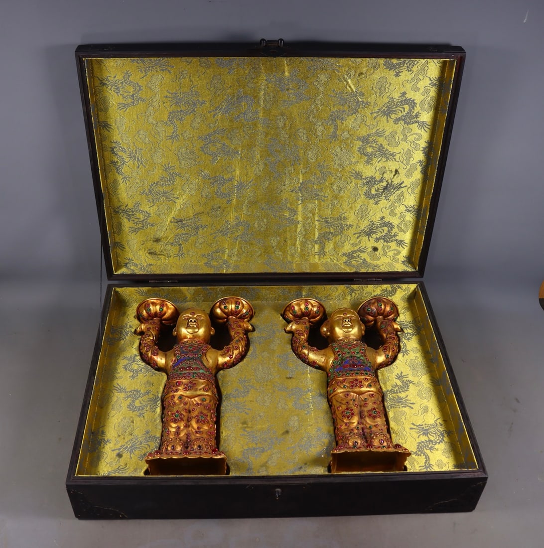 A Pair of Exquisite Gilt Bronze Inlaid Gems Figure-Shaped Candlestick: A Pair of Exquisite Gilt Bronze Inlaid Gems Figure-Shaped Candlestick Tang Dynasty, China Zhenguan Four-character Mark Size:30cmx18cmx7cm Weight:2107g (The Dimensions Of All Batches Are Manually