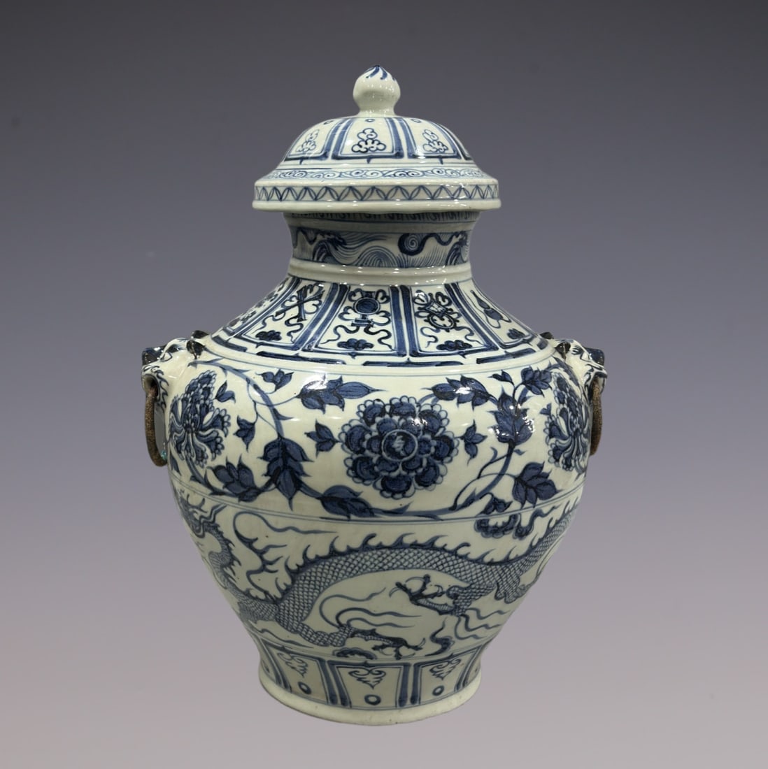 An Exquisite Blue and White Lotus Pattern Dragon Pattern Double-Ears Jar: An Exquisite Blue and White Lotus Pattern Dragon Pattern Double-Ears Jar Yuan Dynasty, China Size:46cm (The Dimensions Of All Batches Are Manually Measured.If You Need More Detailed Information, Pleas