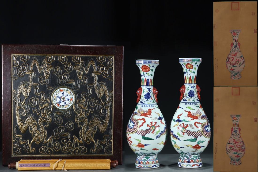 An Exquisite Wucai Blue and White Lotus Pattern Dragon Pattern Seawater Pattern Double-Ears Vase: An Exquisite Wucai Blue and White Lotus Pattern Dragon Pattern Seawater Pattern Double-Ears Vase Ming Dynasty, China Xuande Six-character Mark Without frame Size:80.5cmx42cm Size:56cmx21.5cm (The