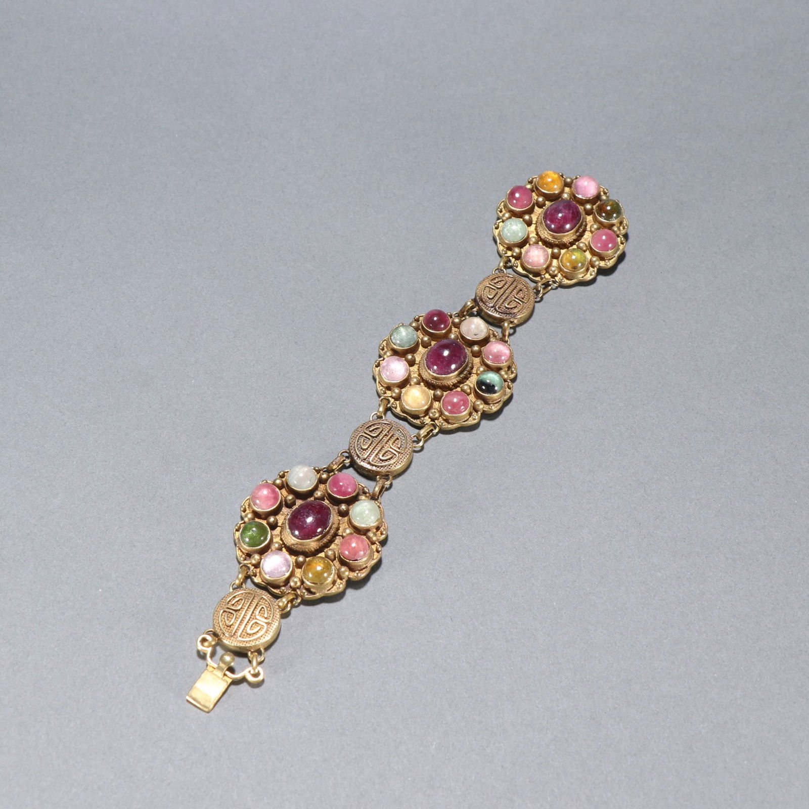 An Exquisite Gilt Silver Inlaid Gems Bracelets: An Exquisite Gilt Silver Inlaid Gems Bracelets Qing Dynasty, China Size:19cmx3.8cm Weight:83.1g (The Dimensions Of All Batches Are Manually Measured.If You Need More Detailed Information, Please
