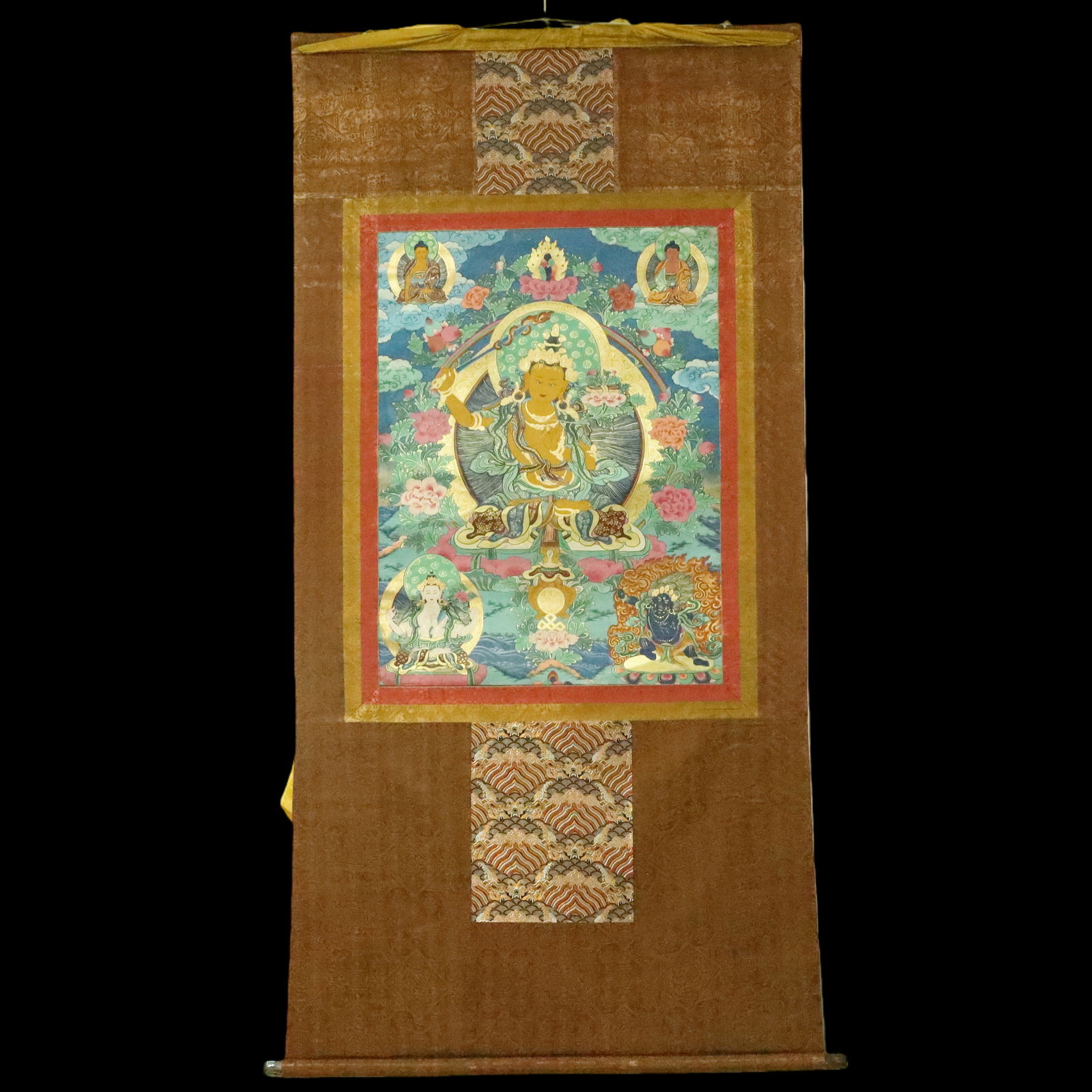 An Exquisite Brocade Painted Color Statue of Manjusri Tangka: An Exquisite Brocade Painted Color Statue of Manjusri Tangka Ming Dynasty, China Size:85cmx166cm (The Dimensions Of All Batches Are Manually Measured.If You Need More Detailed Information, Please