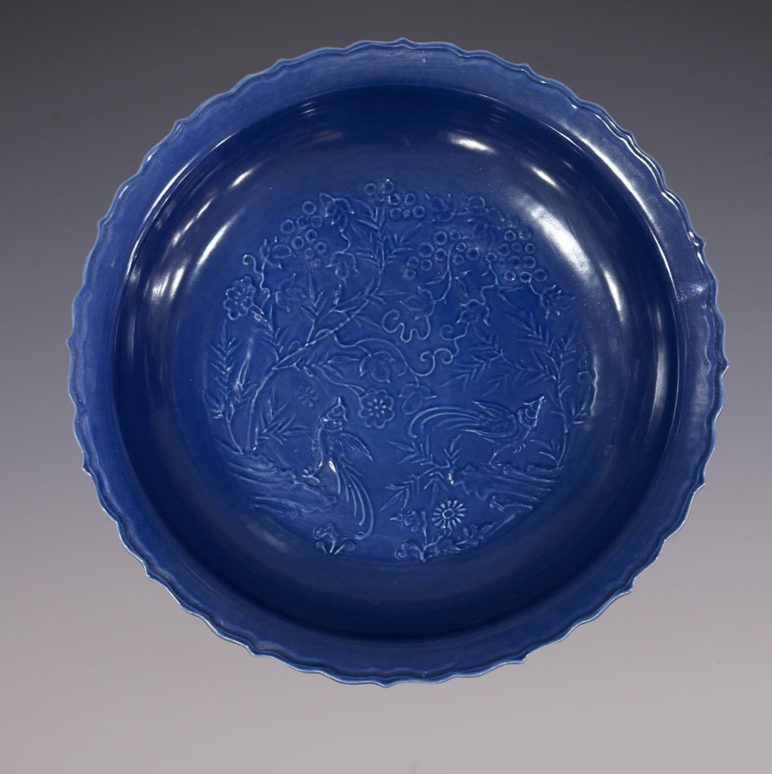 An Exquisite Ji Blue Glazed Flower and Bird Pattern Plate: An Exquisite Ji Blue Glazed Flower and Bird Pattern Plate Yuan Dynasty, China Size:7.5cmx44cm (The Dimensions Of All Batches Are Manually Measured.If You Need More Detailed Information, Please