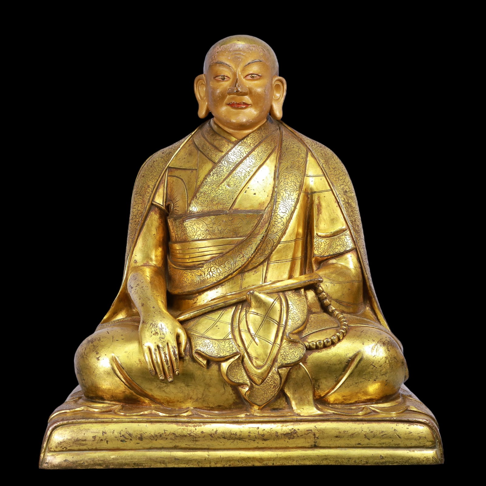 A Exquisite Gilt Bronze Statue of Guru: A Exquisite Gilt Bronze Statue of Guru Ming Dynasty, China Size:51cmx32cmx60cm Weight:41550g (The Dimensions Of All Batches Are Manually Measured.If You Need More Detailed Information, Please