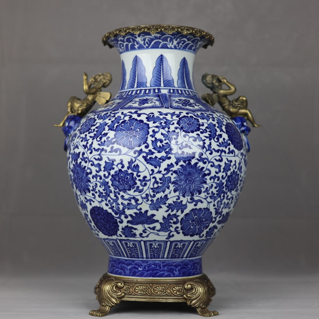 An Exquisite Blue and White Inlaid Bronze Lotus Pattern Seawater Pattern Double-Ears Vase: An Exquisite Blue and White Inlaid Bronze Lotus Pattern Seawater Pattern Double-Ears Vase Qing Dynasty, China Qianlong Six-character Mark Size:48cmx35cm (The Dimensions Of All Batches Are Manually