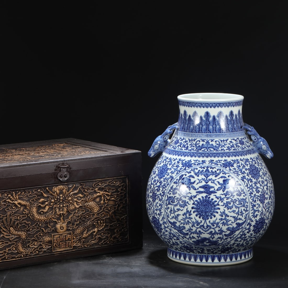 An Exquisite Blue and White Bats and Peach Pattern Lotus Pattern Double-Ears Vase: An Exquisite Blue and White Bats and Peach Pattern Lotus Pattern Double-Ears Vase Qing Dynasty, China Qianlong Six-character Mark Size:47cmx34cm (The Dimensions Of All Batches Are Manually