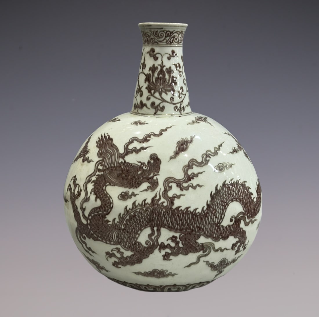 An Exquisite Underglaze-Red Dragon Pattern Lotus Pattern Vase: An Exquisite Underglaze-Red Dragon Pattern Lotus Pattern Vase Ming Dynasty, China Size:45cm (The Dimensions Of All Batches Are Manually Measured.If You Need More Detailed Information, Please