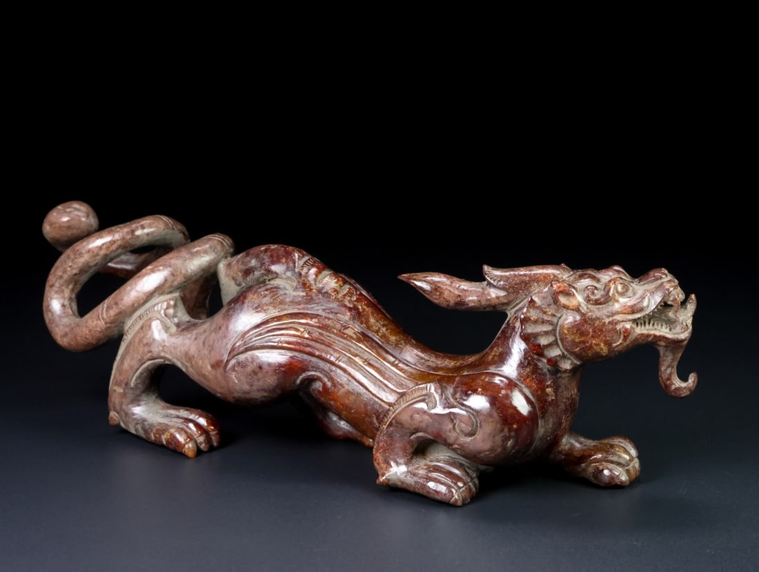 An Exquisite White Jade Dragon Ornament: An Exquisite White Jade Dragon Ornament Han Dynasty, China Size:30.6cmx8cmx7.9cm Weight:1.44kg (The Dimensions Of All Batches Are Manually Measured.If You Need More Detailed Information, Please Contac