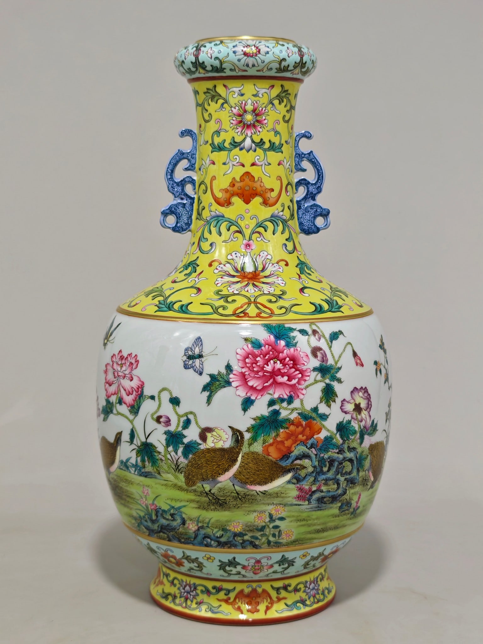 An Exquisite Enamel Lotus Pattern Flower and Bird Pattern with poem Double-Ears Vase: An Exquisite Enamel Lotus Pattern Flower and Bird Pattern with poem Double-Ears Vase Qing Dynasty, China Qianlong Six-character Mark Size:34.5cmx19cm (The Dimensions Of All Batches Are Manually Measur