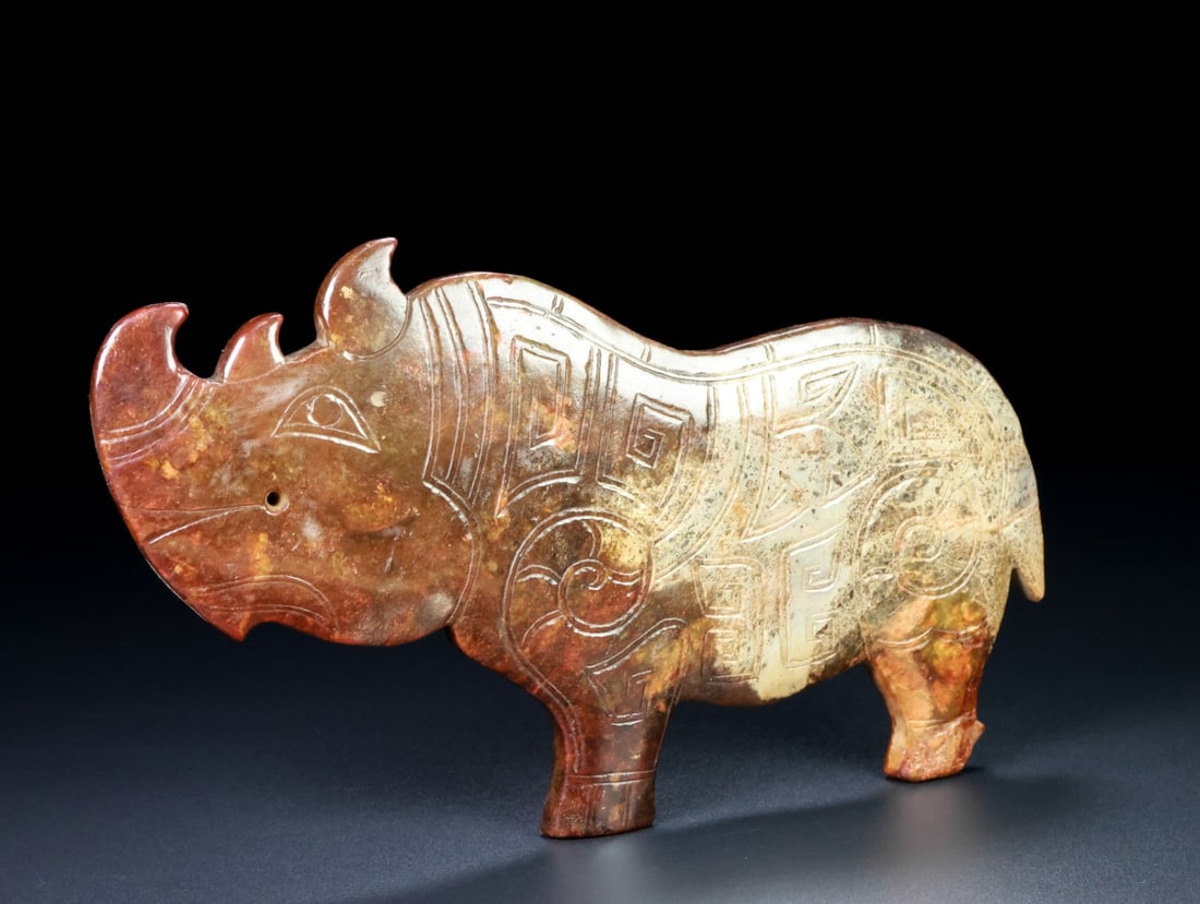 An Exquisite White Jade Rhinoceros Ornament: An Exquisite White Jade Rhinoceros Ornament Han Dynasty, China Size:24.5cmx14cmx0.9cm Weight:672.5g (The Dimensions Of All Batches Are Manually Measured.If You Need More Detailed Information,