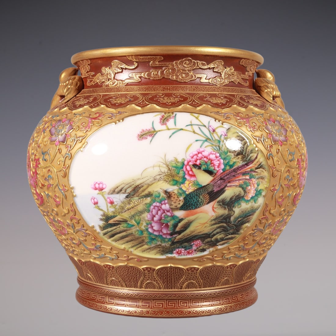 An Exquisite Enamel Lotus Pattern Flower and Bird Pattern Double-Ears Vat: An Exquisite Enamel Lotus Pattern Flower and Bird Pattern Double-Ears Vat Qing Dynasty, China Qianlong Six-character Mark Size:18cmx21cm (The Dimensions Of All Batches Are Manually Measured.If You