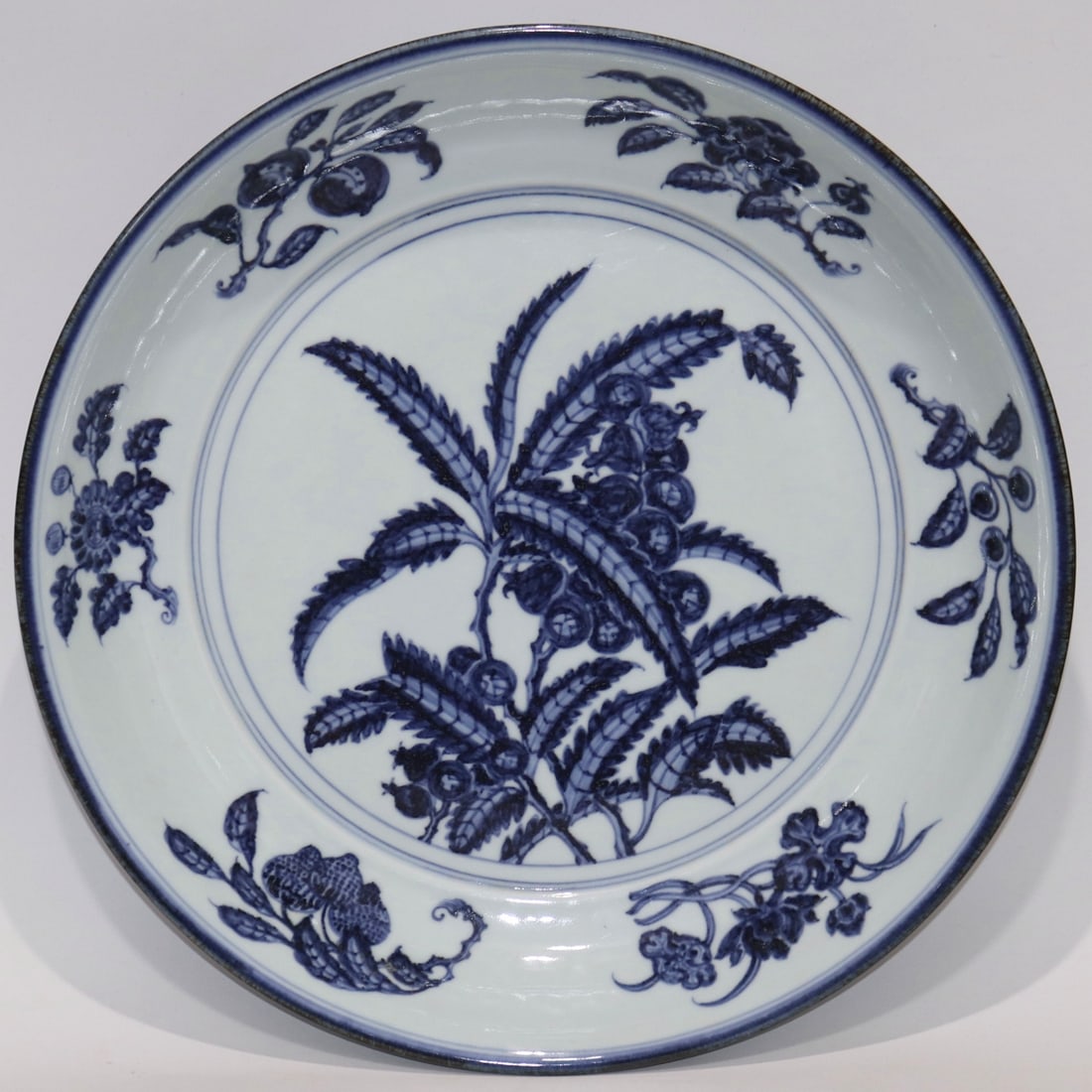 An Exquisite Blue and White Melon and Fruit Pattern Plate: An Exquisite Blue and White Melon and Fruit Pattern Plate Ming Dynasty, China Xuande Six-character Mark Size:7cmx41.2cm (The Dimensions Of All Batches Are Manually Measured.If You Need More