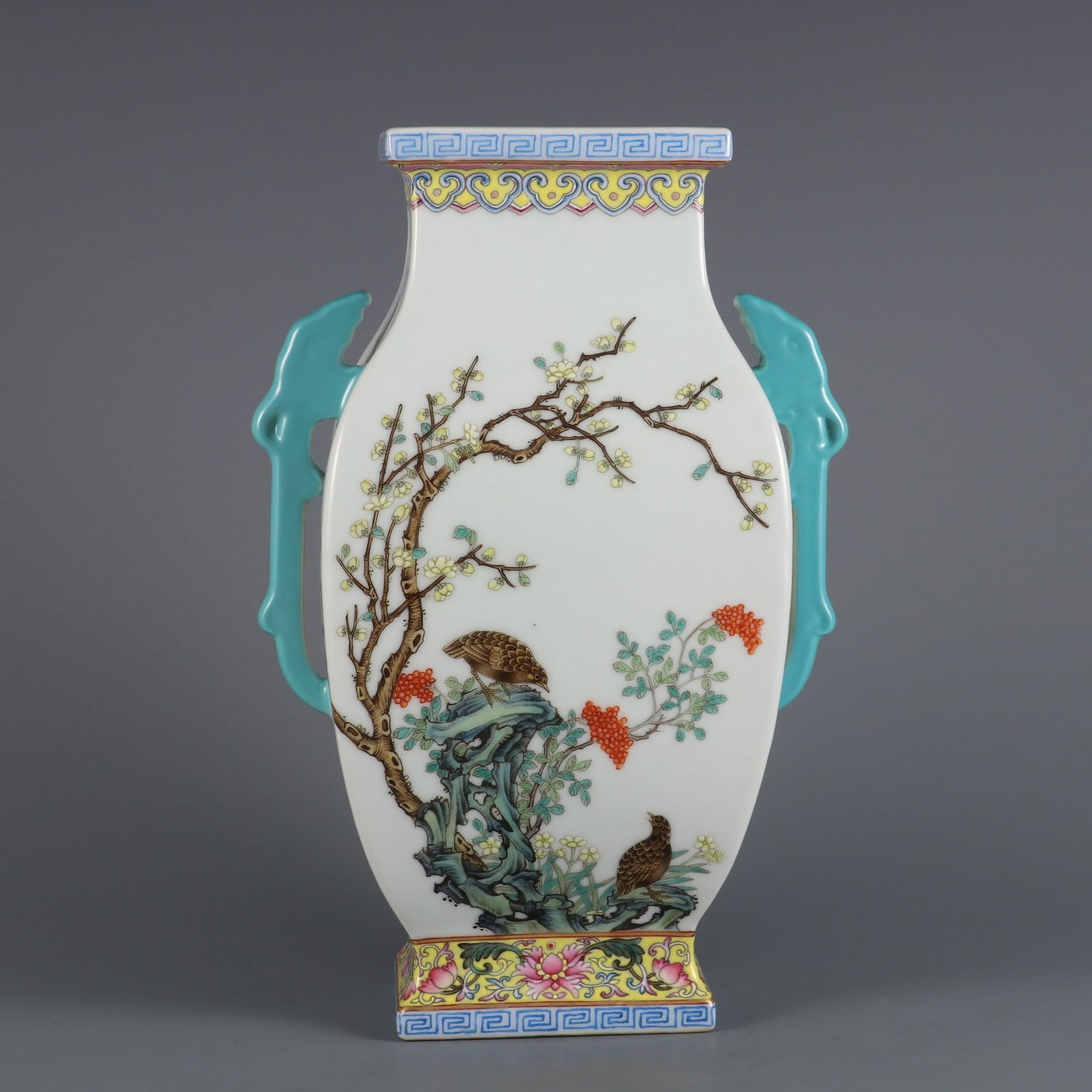 An Exquisite Famille-Rose Lotus Pattern Flower and Bird Pattern Double-Ears Vase: An Exquisite Famille-Rose Lotus Pattern Flower and Bird Pattern Double-Ears Vase Qing Dynasty, China Qianlong Six-character Mark Size:27.5cmx14cm (The Dimensions Of All Batches Are Manually