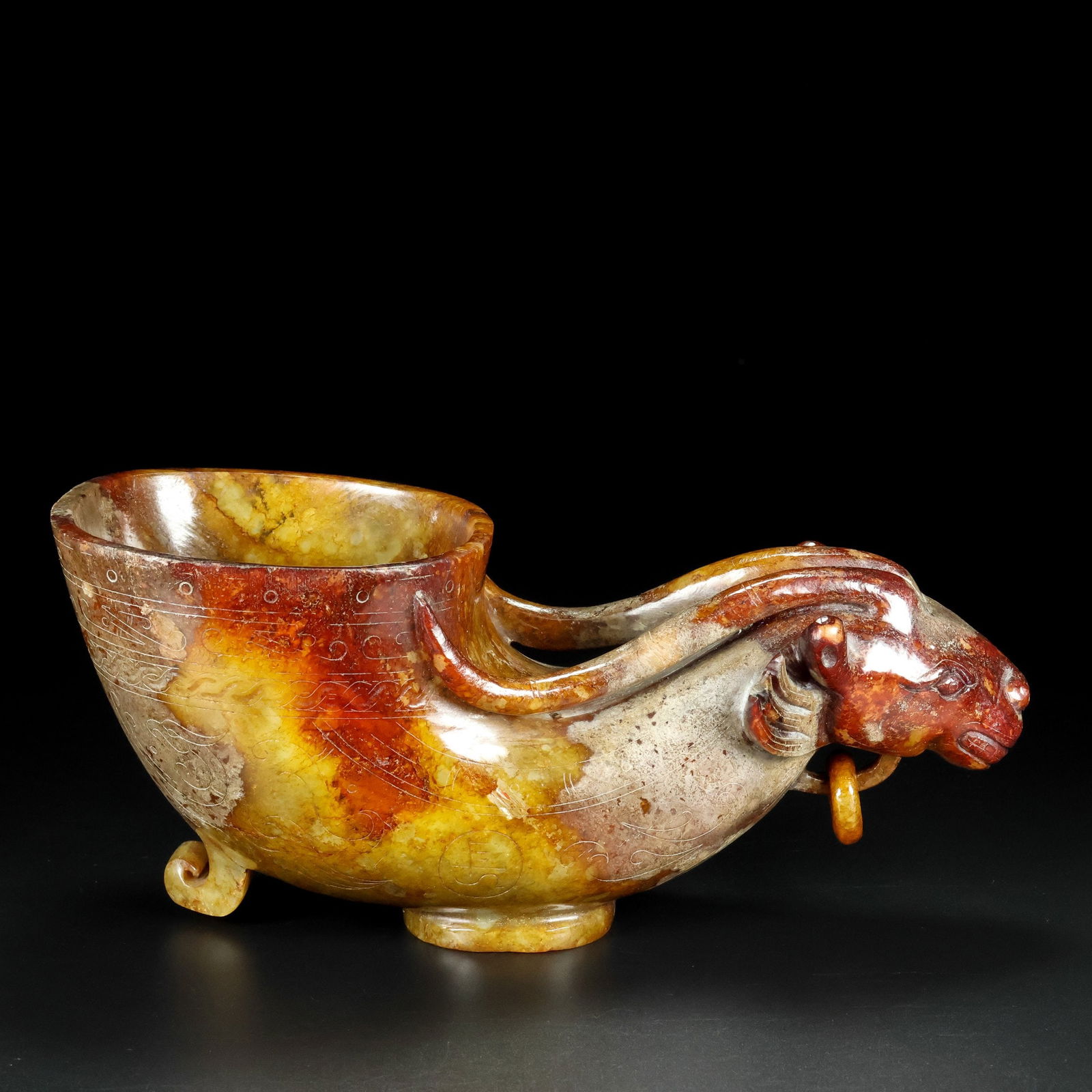 An Exquisite White Jade Auspicious Beast-Shaped Goblet: An Exquisite White Jade Auspicious Beast-Shaped Goblet Qing Dynasty, China Size:23cmx10cmx9cm Weight:1396g (The Dimensions Of All Batches Are Manually Measured.If You Need More Detailed Information, P