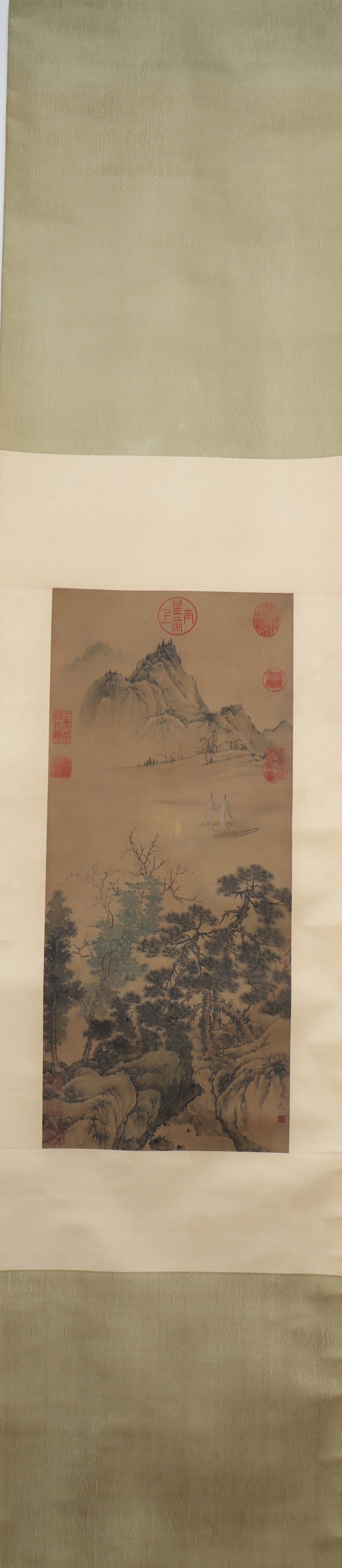 A Chinese Vertical Scroll Ink Painting of Landscape on Silk: A Chinese Vertical Scroll Ink Painting of Landscape on Silk Ma yuan Size:66cmx29cm (The Dimensions Of All Batches Are Manually Measured.If You Need More Detailed Information, Please Contact Our