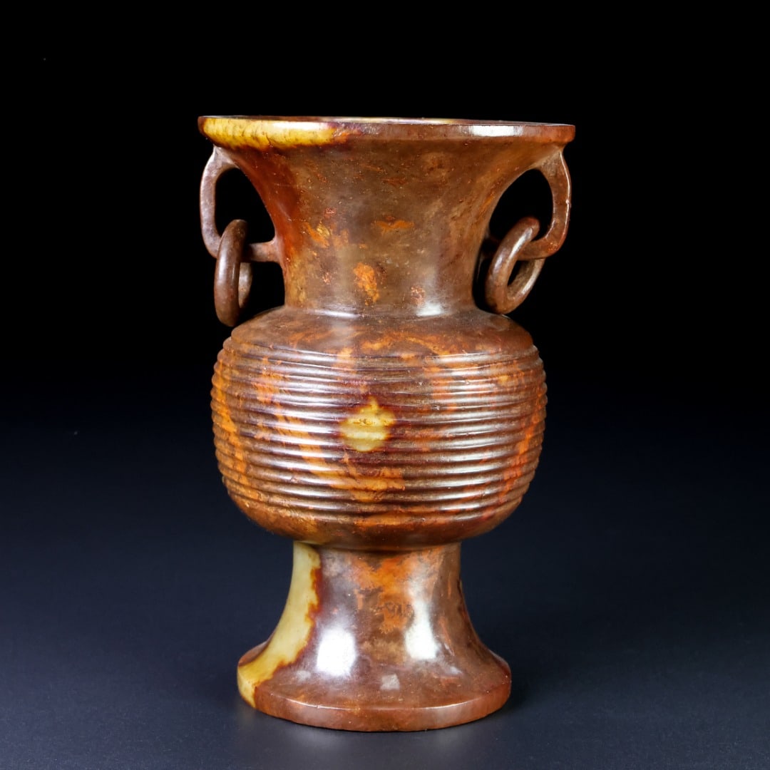 An Exquisite White Jade Double-Ears Vase: An Exquisite White Jade Double-Ears Vase Han Dynasty, China Size:14cmx8.9cm Weight:473.5g (The Dimensions Of All Batches Are Manually Measured.If You Need More Detailed Information, Please Contact Our