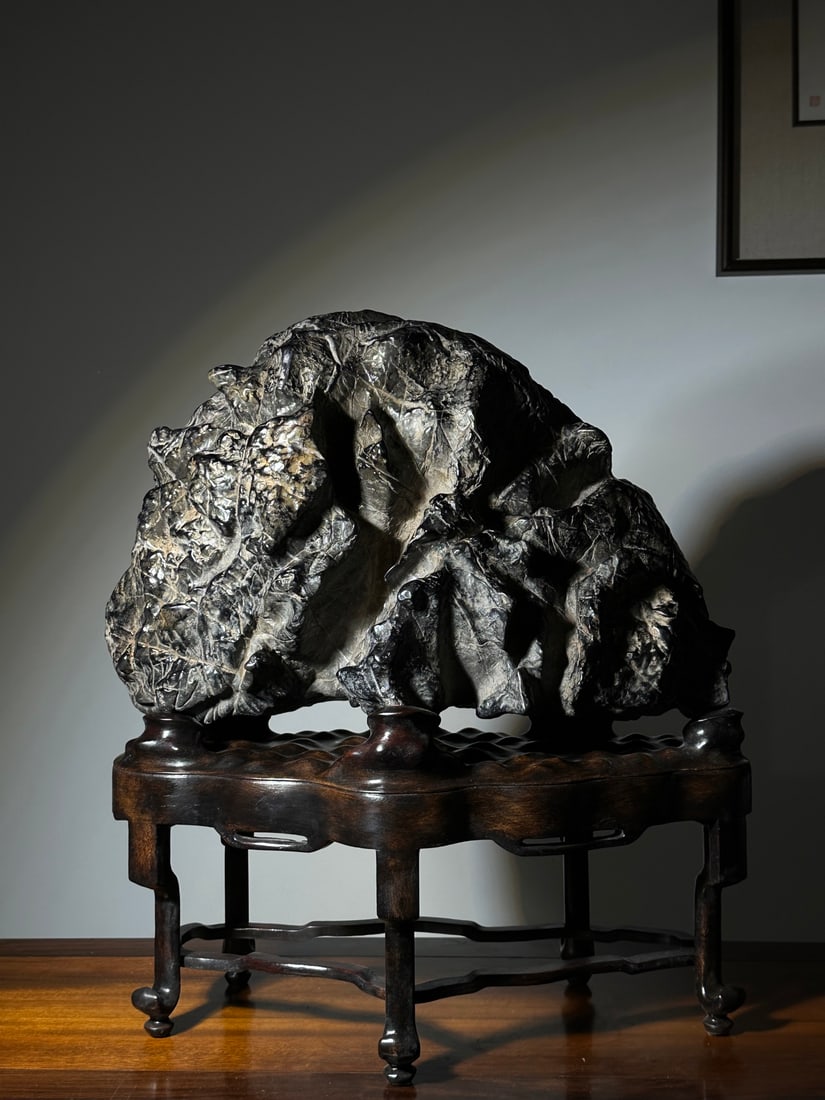 An Exquisite Lingbi Stone Rockery Ornament: An Exquisite Lingbi Stone Rockery Ornament Qing Dynasty, China Size:62cmx54cmx28cm (The Dimensions Of All Batches Are Manually Measured.If You Need More Detailed Information, Please Contact Our