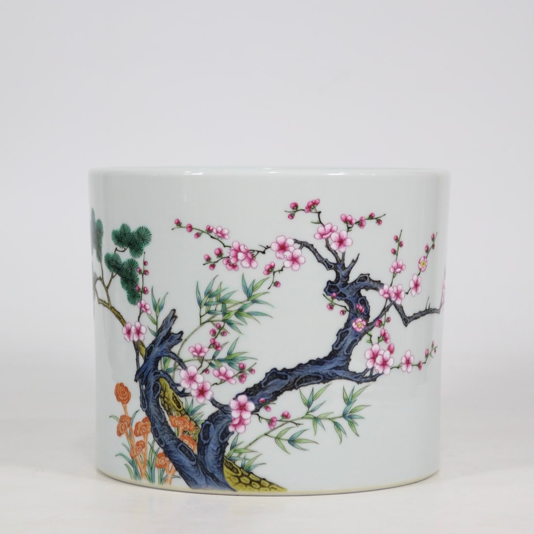 An Exquisite Famille-Rose Pine, Bamboo and Plum Blossom Pattern with poem Brush Pot: An Exquisite Famille-Rose Pine, Bamboo and Plum Blossom Pattern with poem Brush Pot Qing Dynasty, China Yongzheng Six-character Mark Size:16cmx19cm (The Dimensions Of All Batches Are Manually Measured