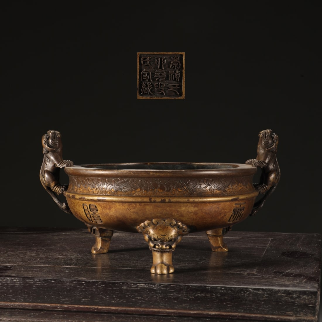 An Exquisite Bronze Double-Ears and Tripod Censer: An Exquisite Bronze Double-Ears and Tripod Censer Ming Dynasty, China Size:13cmx19.2cm Weight:2850g (The Dimensions Of All Batches Are Manually Measured.If You Need More Detailed Information,