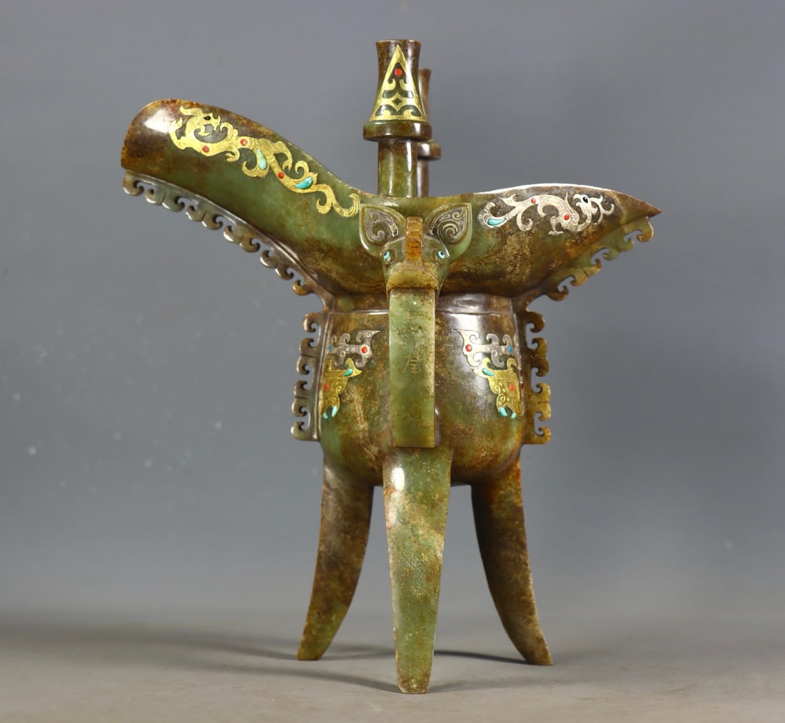 An Exquisite White Jade Gold and Silver Dragon Pattern Goblet: An Exquisite White Jade Gold and Silver Dragon Pattern Goblet Han Dynasty, China Size:23cmx19cmx12.5cm Weight:940g (The Dimensions Of All Batches Are Manually Measured.If You Need More Detailed Inform