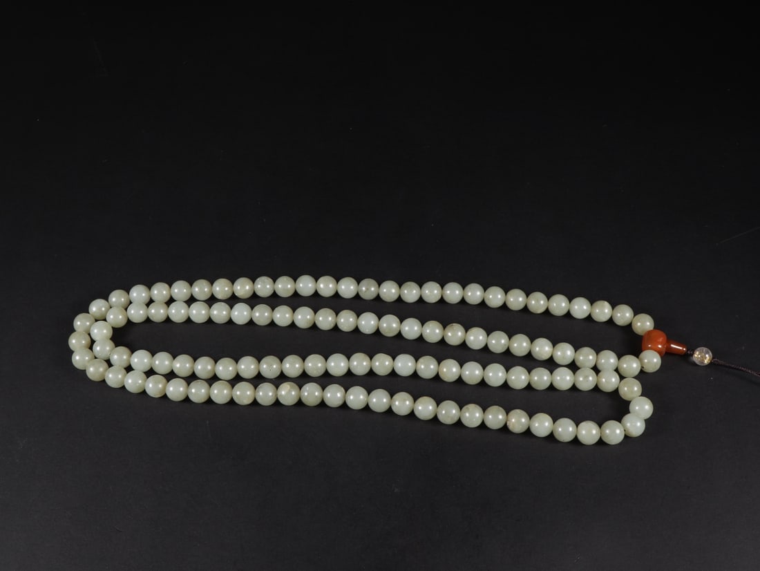 An Exquisite White Jade Round beads: An Exquisite White Jade Round beads Qing Dynasty, China Size:1.1cm Weight:242g (The Dimensions Of All Batches Are Manually Measured.If You Need More Detailed Information, Please Contact Our