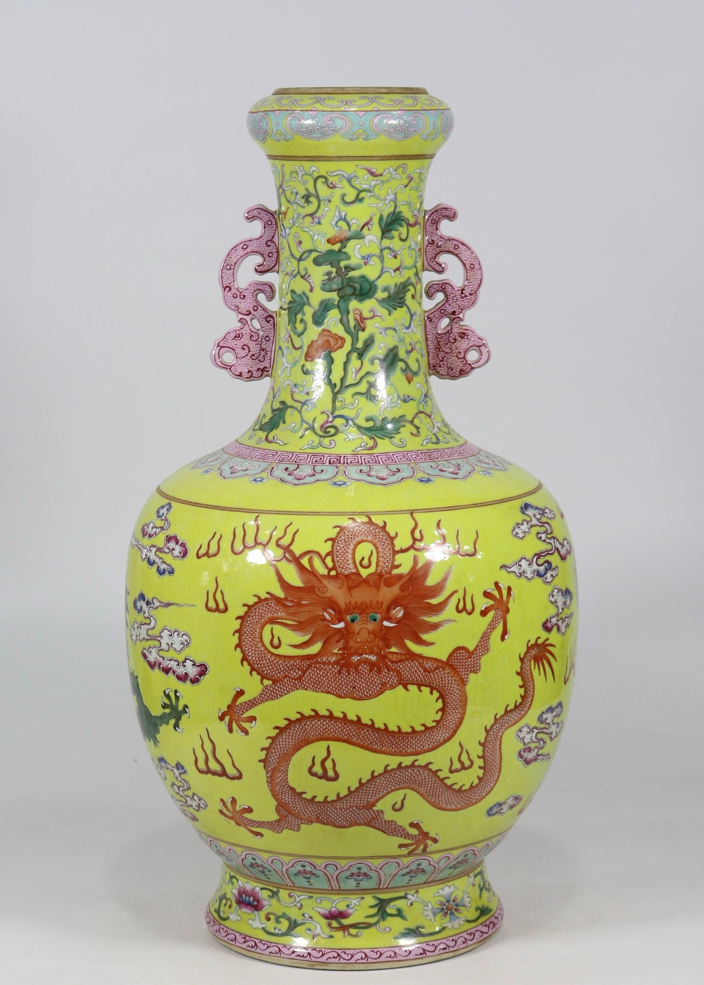 An Exquisite Famille-Rose Lotus Pattern Dragon Pattern Double-Ears Vase: An Exquisite Famille-Rose Lotus Pattern Dragon Pattern Double-Ears Vase Qing Dynasty, China Qianlong Six-character Mark Size:51.2cmx24.5cm (The Dimensions Of All Batches Are Manually Measured.If