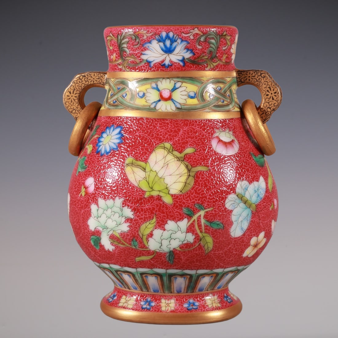 An Exquisite Famille-Rose Ruby Red-Glazed Lotus Pattern Flower and Butterfly Pattern Double-Ears: An Exquisite Famille-Rose Ruby Red-Glazed Lotus Pattern Flower and Butterfly Pattern Double-Ears Vase Qing Dynasty, China Qianlong Six-character Mark Size:13.7cmx10cm (The Dimensions Of All Batches