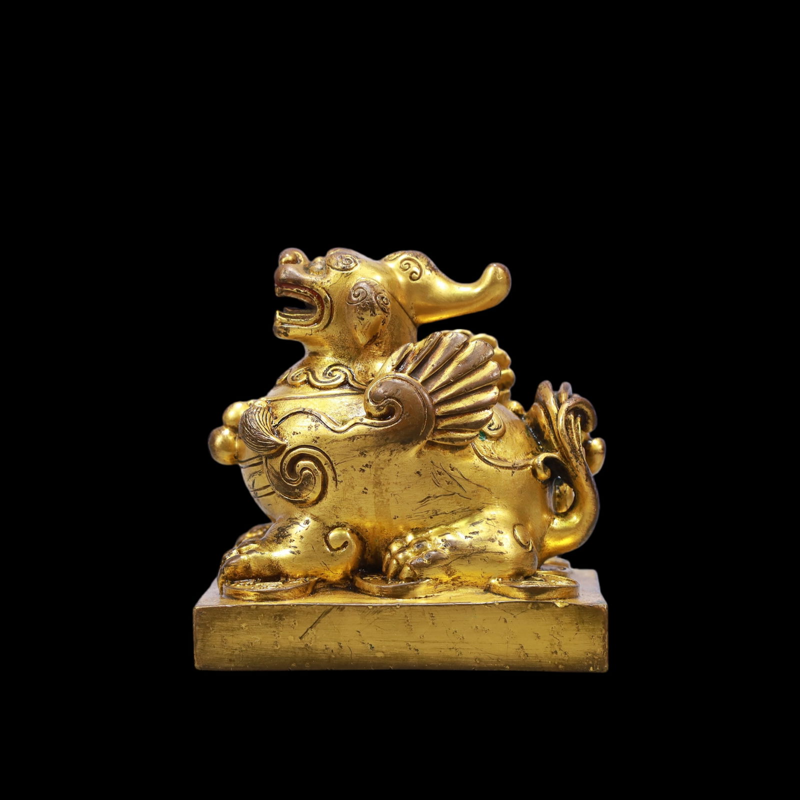 A Exquisite Gilt Bronze Auspicious Beast: A Exquisite Gilt Bronze Auspicious Beast Ming Dynasty, China Size:9.5cmx7.5cmx10cm Weight:900g (The Dimensions Of All Batches Are Manually Measured.If You Need More Detailed Information, Please