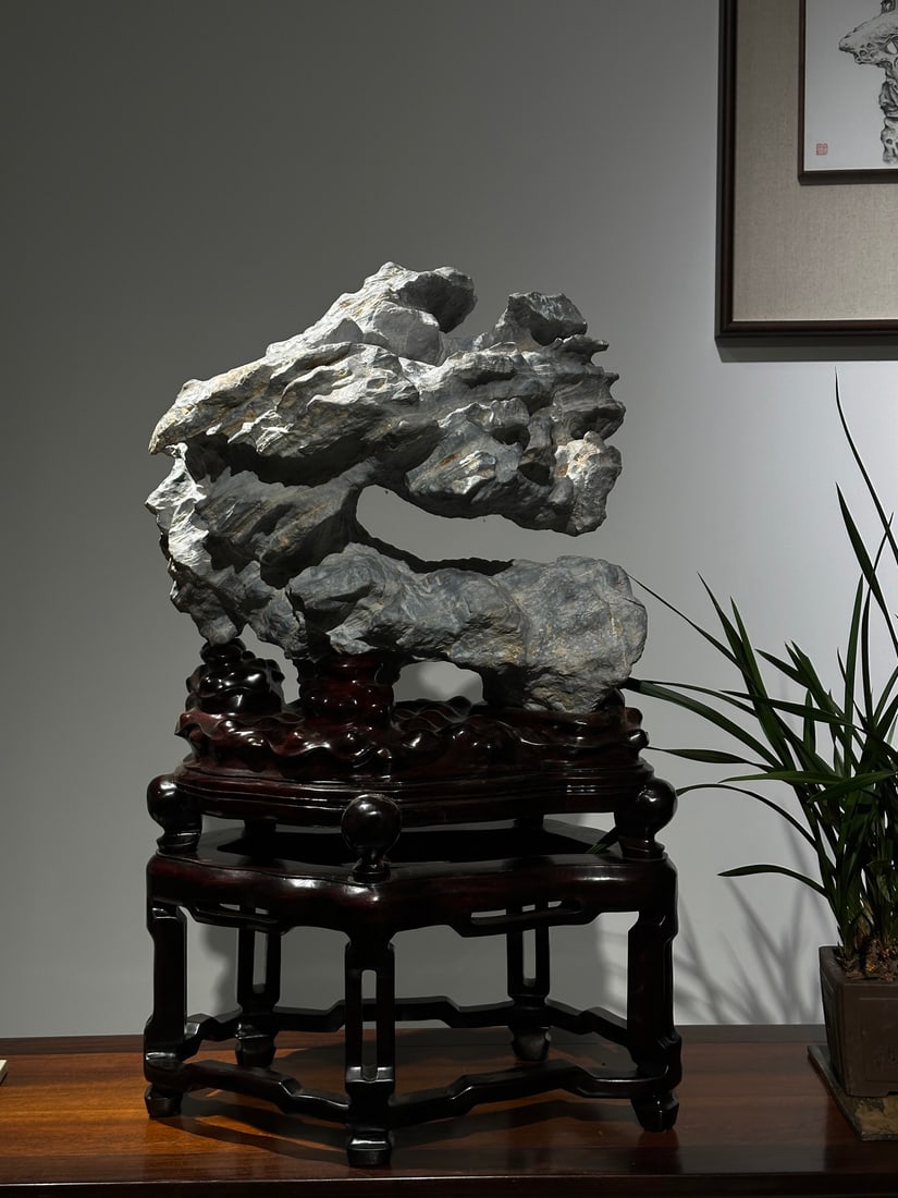 An Exquisite Lingbi Stone Ornament: An Exquisite Lingbi Stone Ornament Qing Dynasty, China Size:78cmx46cmx24cm (The Dimensions Of All Batches Are Manually Measured.If You Need More Detailed Information, Please Contact Our Customer