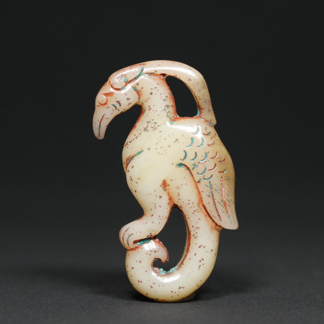 An Exquisite White Jade Phoenix Pendant: An Exquisite White Jade Phoenix Pendant Han Dynasty, China Size:6.5cmx3.5cmx1.3cm Weight:37.6g (The Dimensions Of All Batches Are Manually Measured.If You Need More Detailed Information, Please